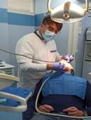 Studio Dentistico New Smile Center logo