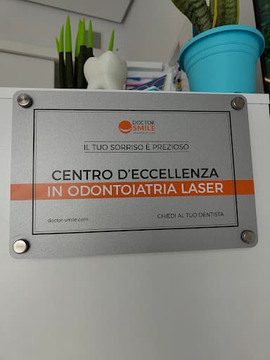 Studio Dentistico Centro Odontoiatria Estetica logo