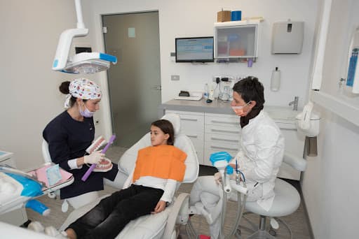 Studio Dentistico Dental Com logo