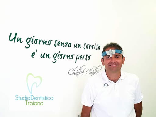 Studio Dentistico STUDIO DENTISTICO TROIANO logo