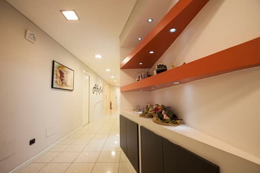 Studio Dentistico Alfamed logo